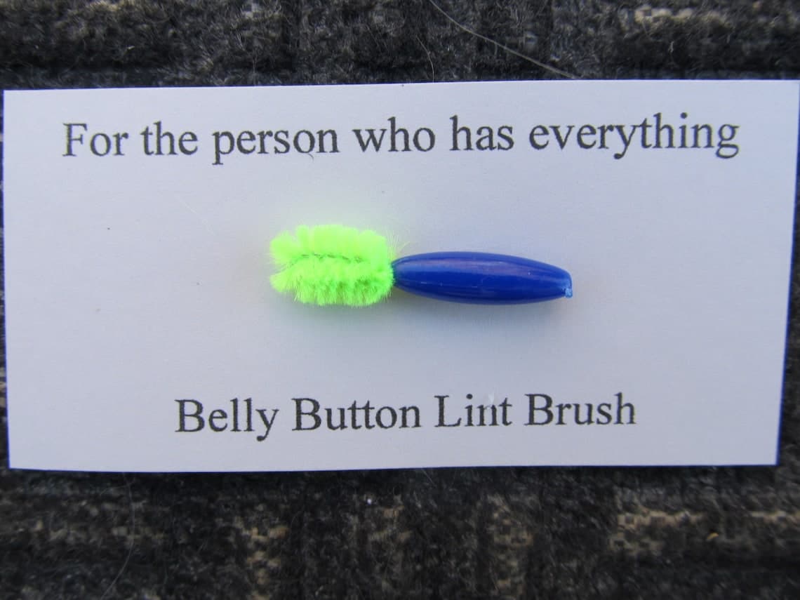 belly button lint brush for the Person who has everything image 1