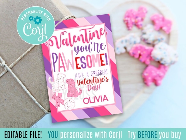 May include: A pink and purple Valentine's Day card with a striped background. The card features a dog paw print and the text 'Valentine, you're PAWESOME! Have a GRRRREAT Valentine's Day!' The card is editable and can be personalized with the name 'Olivia'.