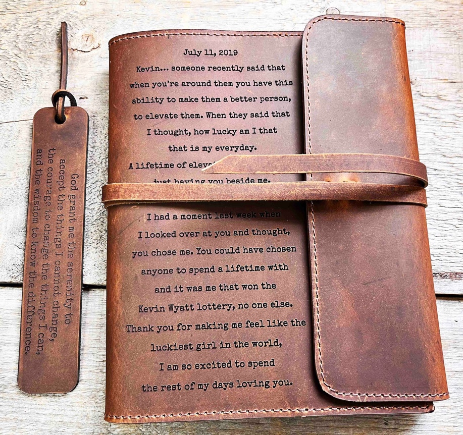 A leather book case and a bookmark Description automatically generated