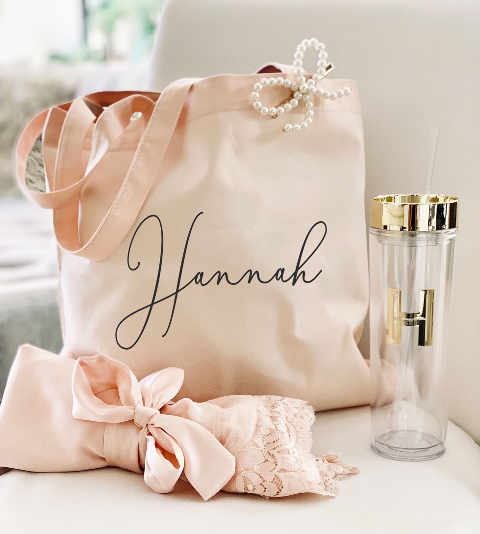 Features a cotton canvas tote bag with personalized name embroidery, ideal for bridesmaid gifts