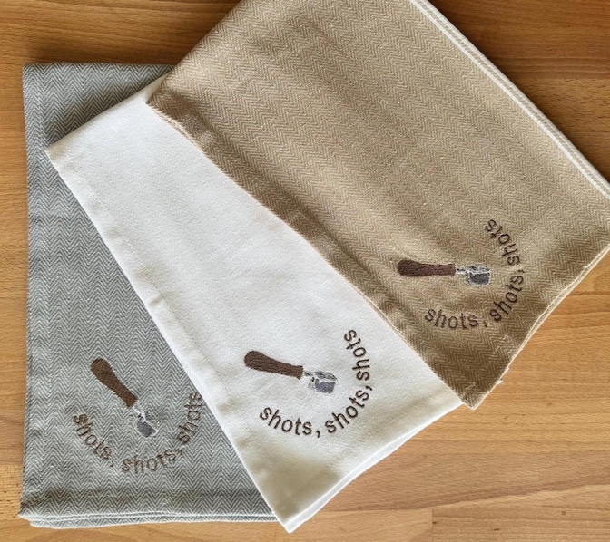 A group of towels on a table Description automatically generated