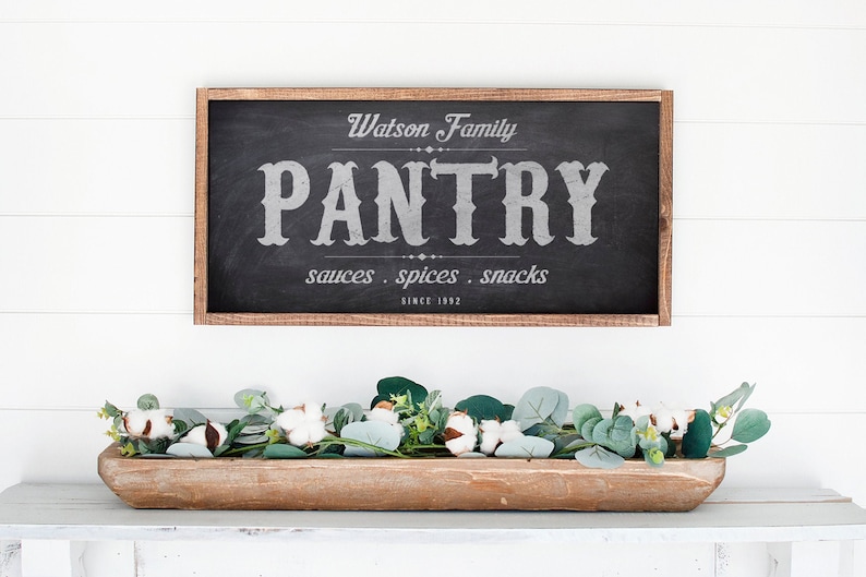 A sign on a wall Description automatically generated