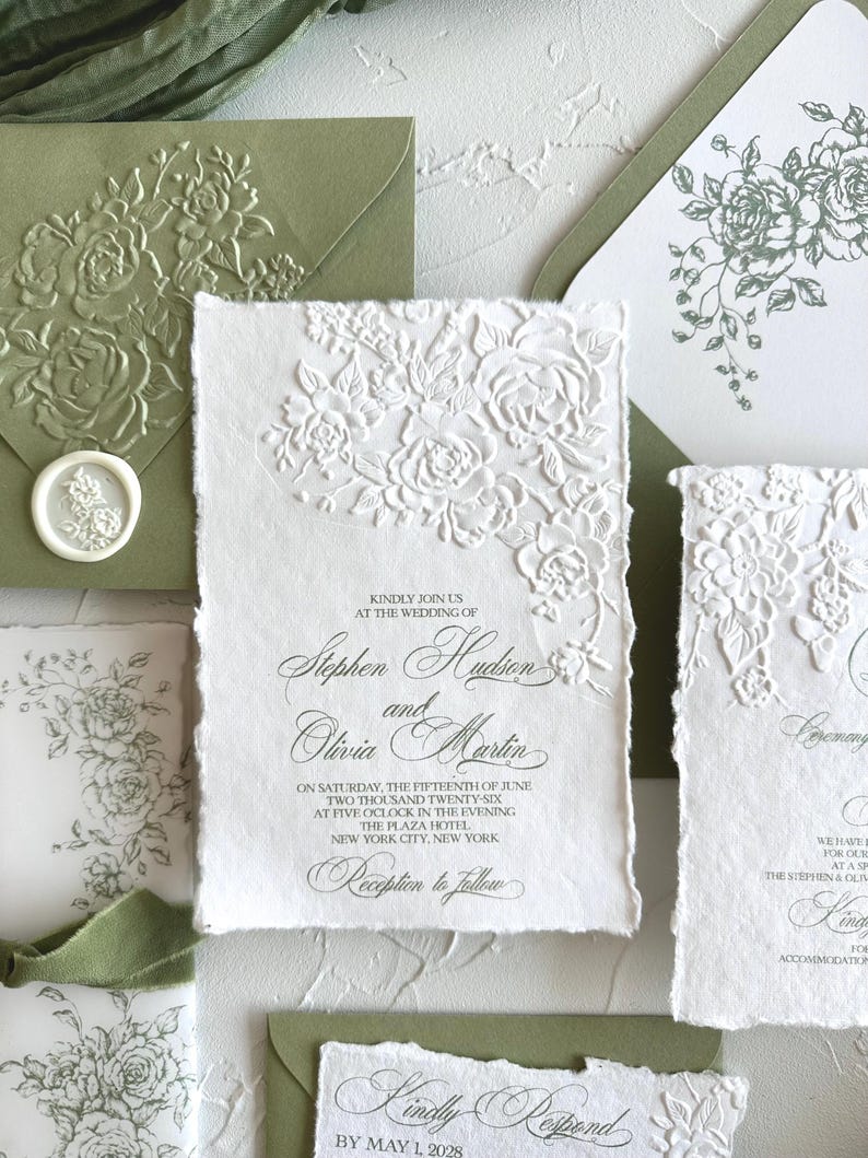 Embossing wedding invitations on handmade cotton paper with deckled edges and sage green rose design elegant romantic stationery set