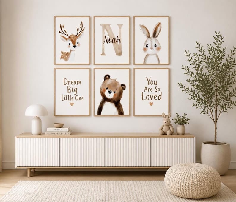 May include: Six framed nursery art prints featuring watercolor illustrations of a deer, a bunny, and a bear, along with the name "Noah" and the phrases "Dream Big Little One" and "You Are So Loved". The prints are in neutral tones.